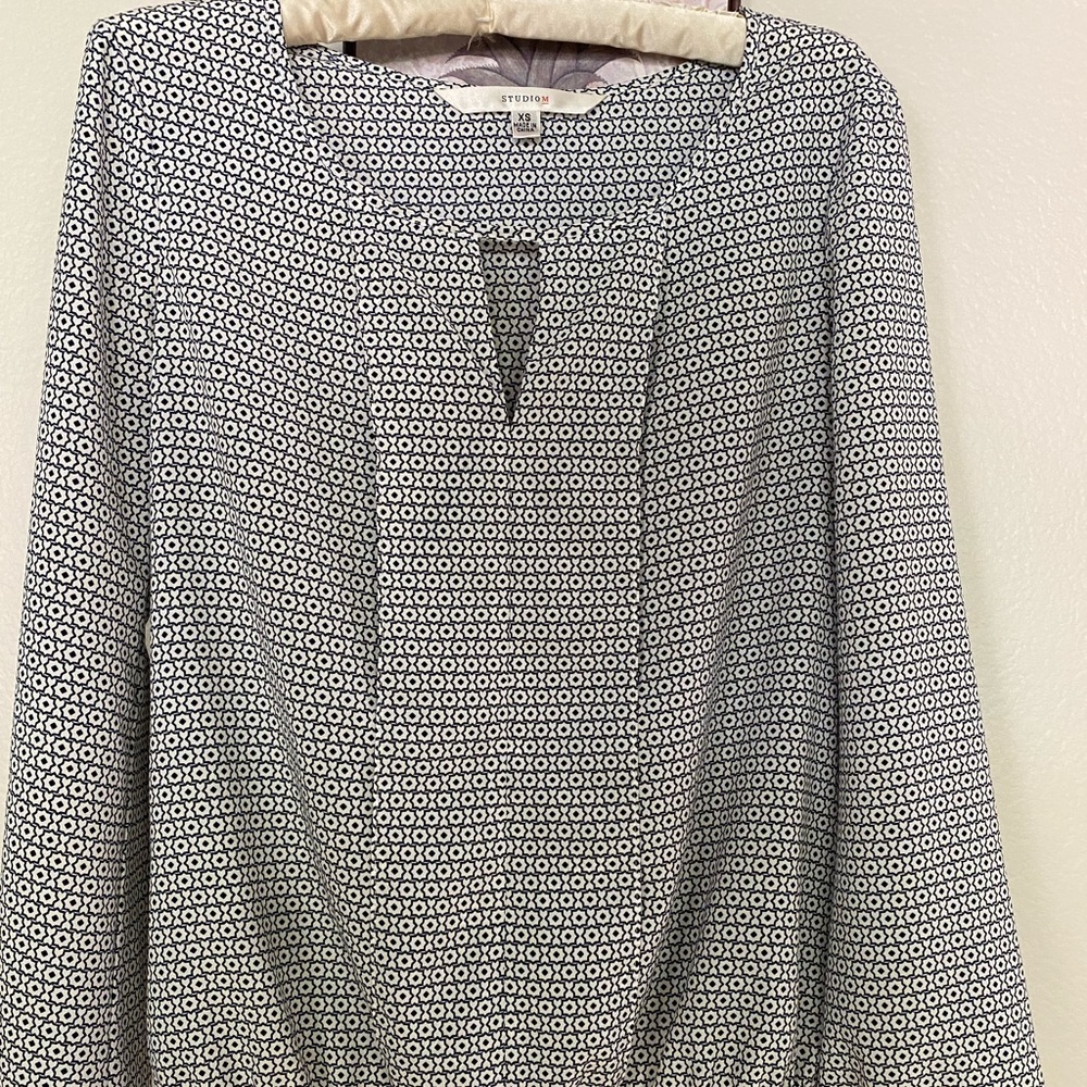 Adorable blouse. Too big.